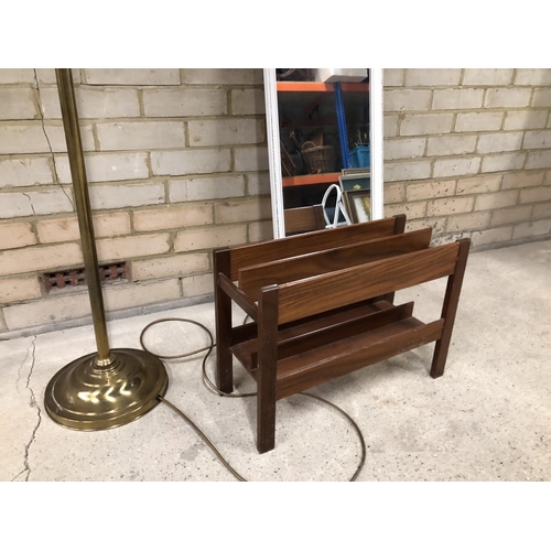 54 - A brass standard lamp, teak magazine rack and a white mirror