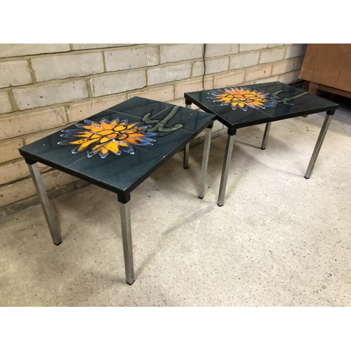 81 - A pair of mid century tile top tables