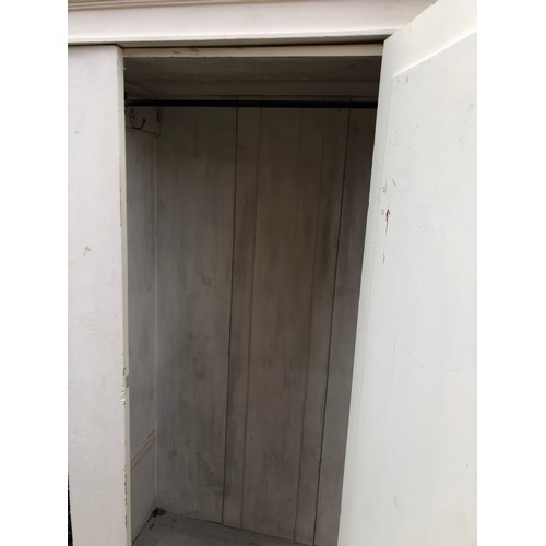 39 - A white painted pine single door wardrobe