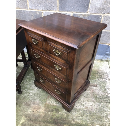 16 - A reproduction oak hifi cabinet together with two oak gateleg tables