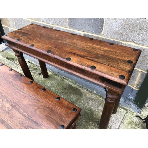 34 - A Indian hardwood coffee table together with a matching console table