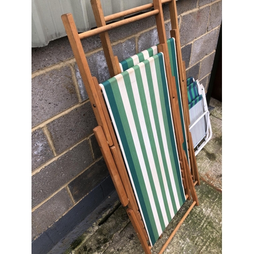 4 - Two vintage wooden folding deck chairs together with two modern folding chairs