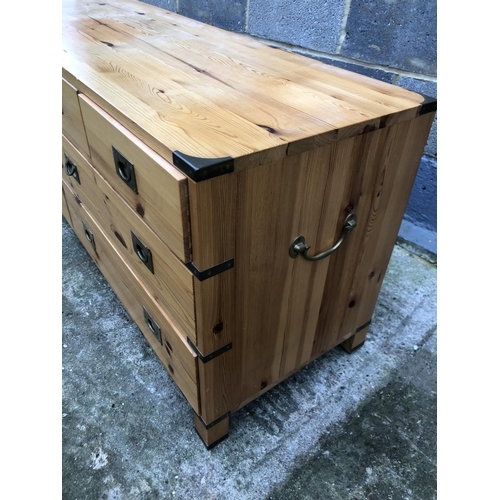 50 - A military style pine chest of eight drawers 150 x 46 x 61cm