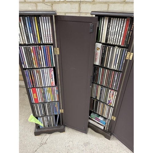 104 - Two book effect cd racks filled with a cd collection