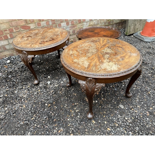111 - A pair of circular reproduction mahogany occasional tables together with a pie crust table