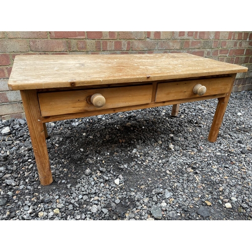 115 - A low pine two drawer coffee table