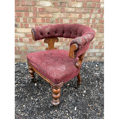 121 - A Victorian oak bow back desk chair with horse hair filled seat. Stamped GWR