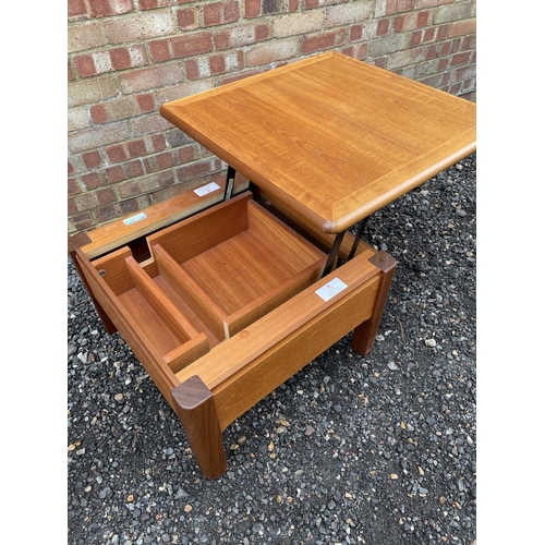 130 - A mid century teak storage coffee table  by Nathan