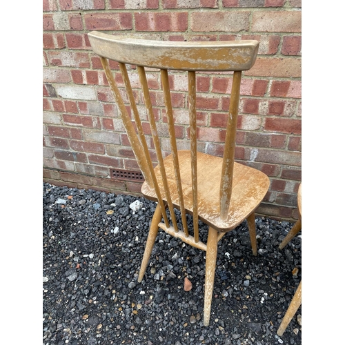 132 - A set of four Ercol blonde Elm Stickback chairs