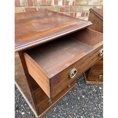 134 - A pair of Victorian mahogany four drawer chests, with brass drop hoop handles 60x57x80 each