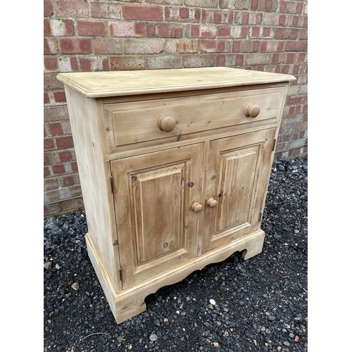 139 - A striped pine sideboard, single drawer over cupboard base