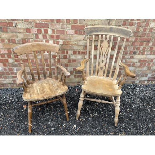 140 - Two country pine Windsor carver chairs