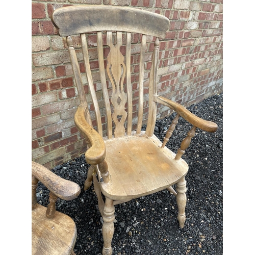 140 - Two country pine Windsor carver chairs