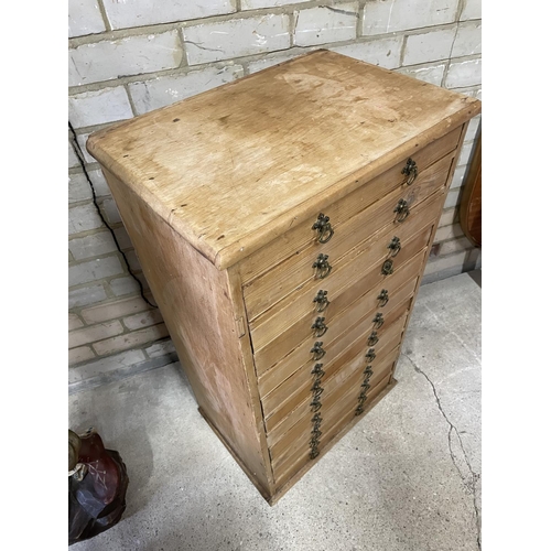 158 - An antique pine bank of 12 filing drawers 49x34x86