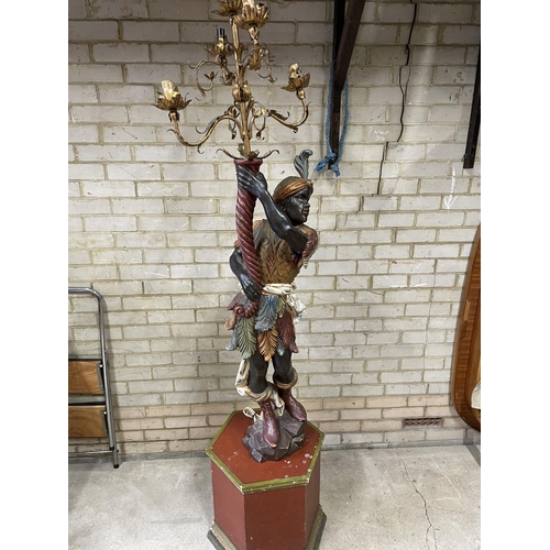 160 - A gilt blackamoor statue lamp on a pedestal 205cm total height