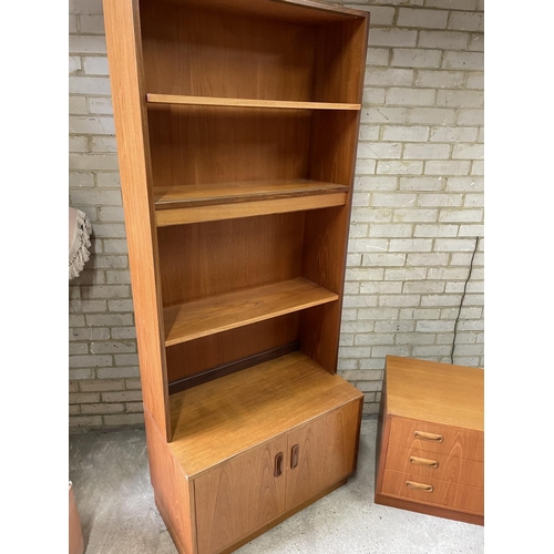 178 - A g Plan teak three drawer chest together with a bookcase cabinet