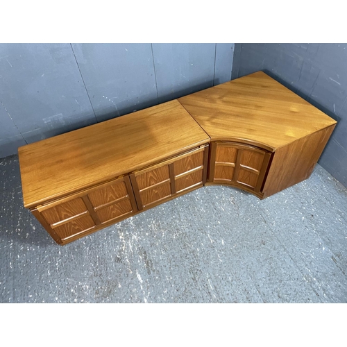 18 - A two door Nathan teak sideboard unit together with a single door Nathan corner unit