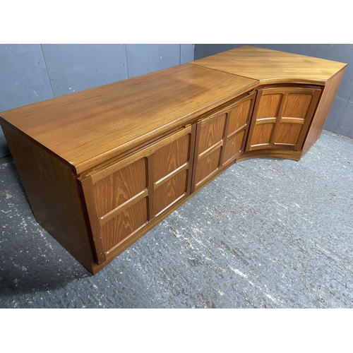 18 - A two door Nathan teak sideboard unit together with a single door Nathan corner unit