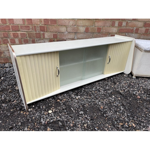 193 - A 1950's kitchen cabinet section together with a loom style ottoman