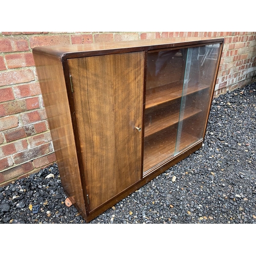 209 - A mid century side by side bookcase cupboard by goodman