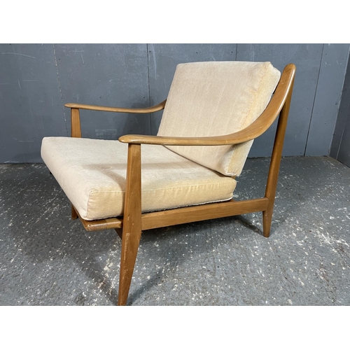 21 - A mid 20th century Danish style 'slot together' lounge chair,