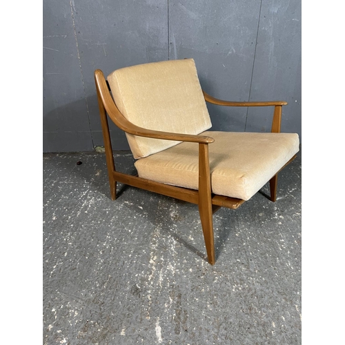 21 - A mid 20th century Danish style 'slot together' lounge chair,