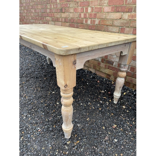 214 - A solid pine farmhouse dining table 183x86