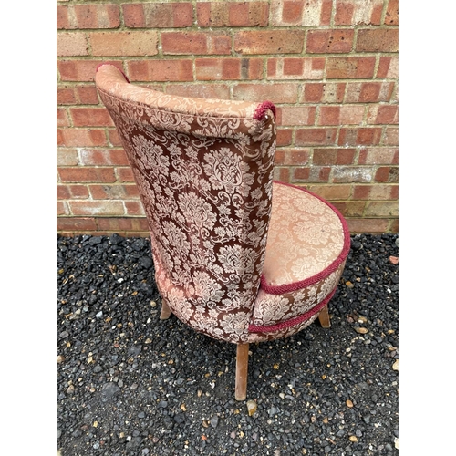 216 - A red and gold pattern bedroom chair