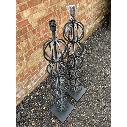 221 - A pair of modern black iron floor standing lamps