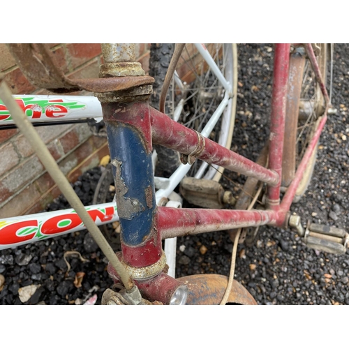 226 - A 1960's Raleigh cycle together with a white falcon mountain bike