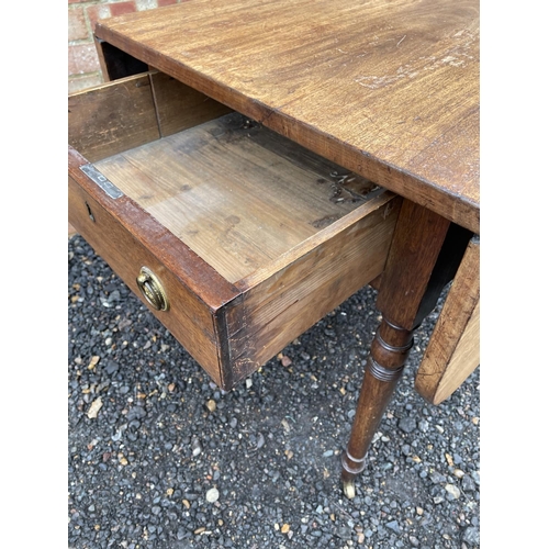 241 - A Victorian mahogany Pembroke table with a single drawer