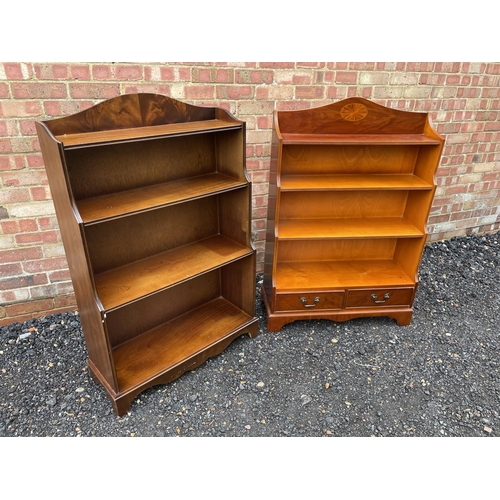 242 - A yew waterfall front bookcase together with a mahogany open fromted bookcase