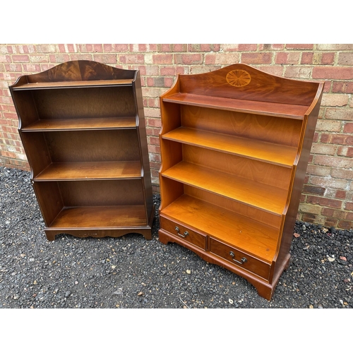 242 - A yew waterfall front bookcase together with a mahogany open fromted bookcase