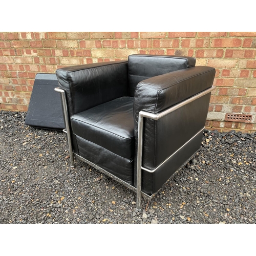 245 - A modern black and chrome lc2 style chair