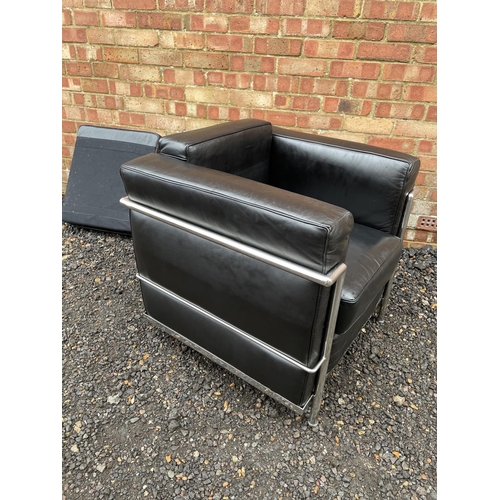 245 - A modern black and chrome lc2 style chair