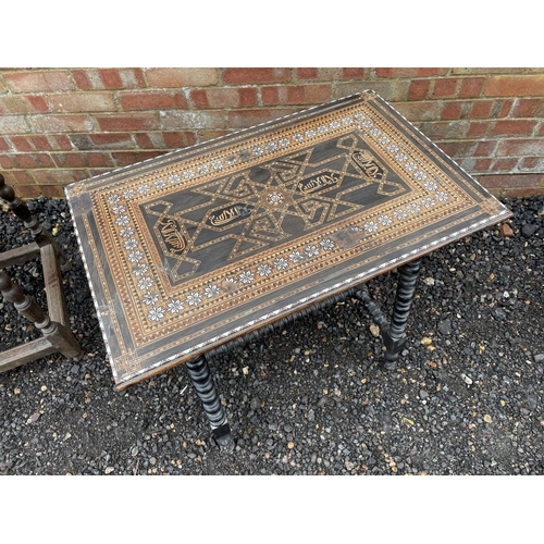 252 - An eastern style inlaid table together with an oak occasional table