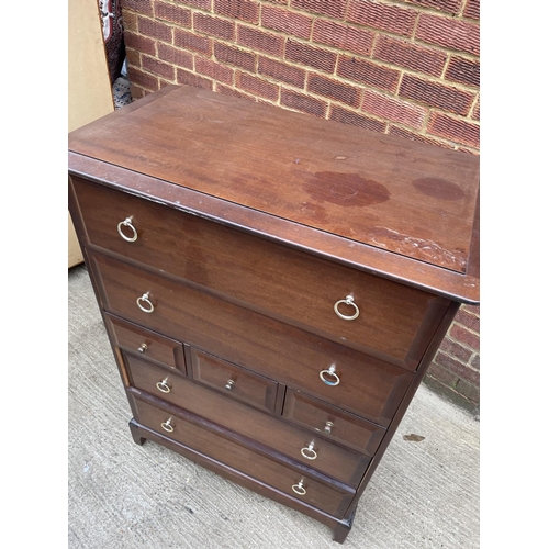 266 - A stag minstrel tallboy chest of seven drawers