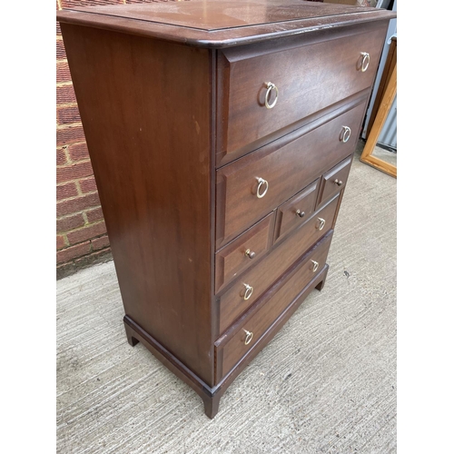 266 - A stag minstrel tallboy chest of seven drawers