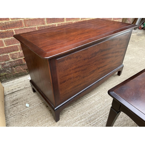 267 - A stag minstrel ottoman together with a matching coffee table