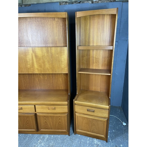 27 - A pair of large teak lounge units by William Lawrence furniture