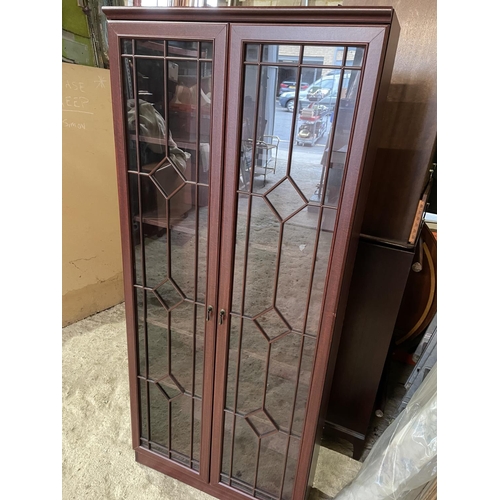 271 - A tall mahogany effect display cabinet