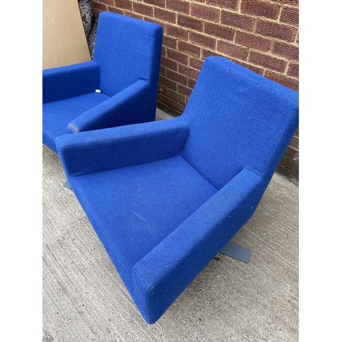 275 - A pair of modern blue designer office swivel chairs