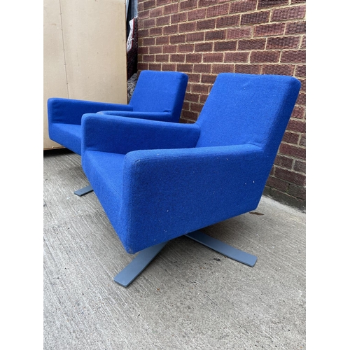 275 - A pair of modern blue designer office swivel chairs