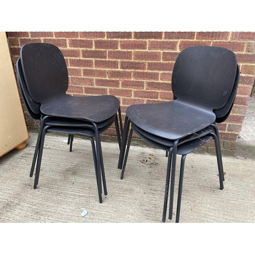 278 - A set of six black stacking chairs by Ikea