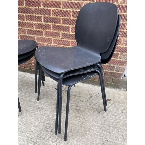 278 - A set of six black stacking chairs by Ikea