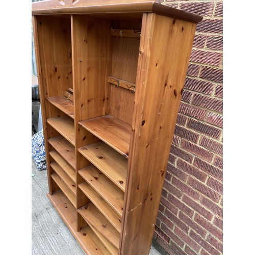 279 - A tall pine open fronted bookcase with adjustable shelves