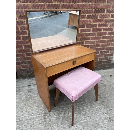 287 - A mid century teak dressing table with stool