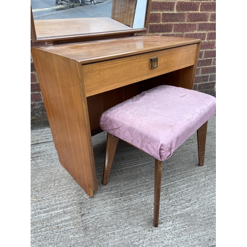 287 - A mid century teak dressing table with stool