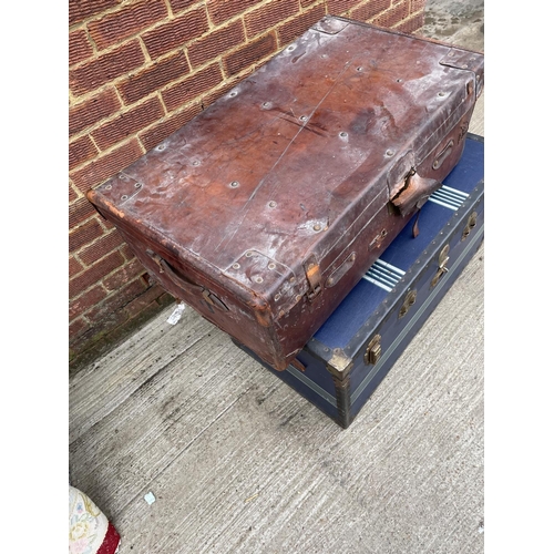 289 - Two large vintage traveling trunks