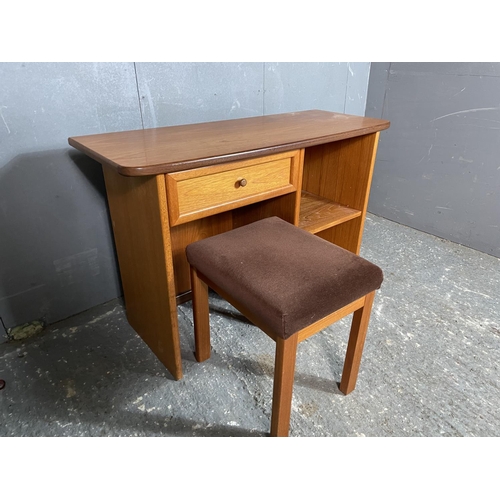 30 - A mid century teak kneehole dressing table / desk together with stool 108x42x70